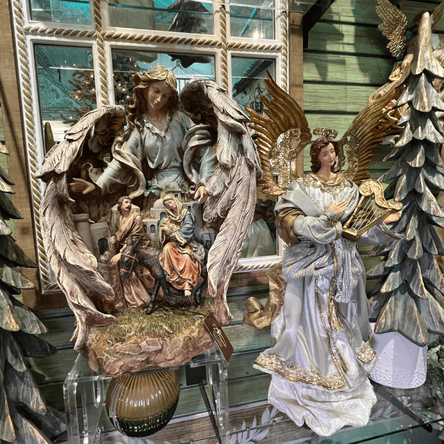 Decorative nativity scene with angel figurines and trees  in the moments in thyme room at Dewayne's in Selma, NC