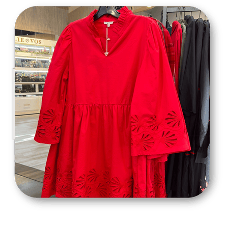 Red dress with cut-out sleeves in the boutique at Dewayne's in Selma, NC minutes from Raleigh, Cary, Clayton, Garner, Smithfield, Goldsboro