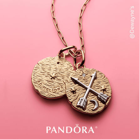 Pandora necklace with two charms on a pink background in the boutique at Dewayne's in Selma, NC minutes from Raleigh, Cary, Clayton, Garner, Smithfield, Goldsboro