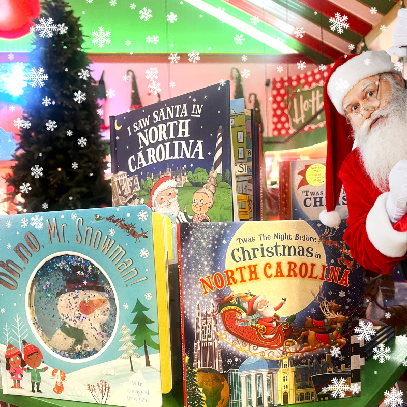a variety of Christmas-themed books in santa's workshop in christmas land 2025 at dewayne's