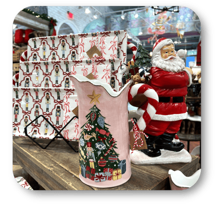 Decorative Christmas-themed serveware with a Santa Claus figurine at Dewayne's in Selma, NC minutes from Raleigh, Cary, Clayton, Garner, Smithfield, Goldsboro