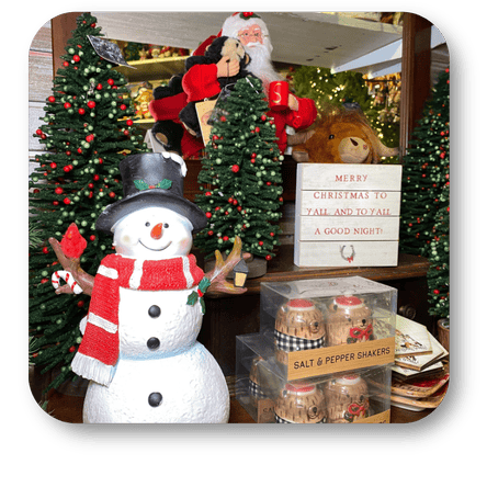 Christmas-themed display with snowman, Santa Claus, and Christmas trees in the country Christmas room of Christmas Land 2025 at Dewayne's in Selma, NC minutes from Raleigh, Cary, Clayton, Garner, Smithfield, Goldsboro