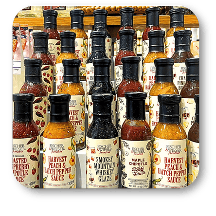 Assorted bottles of Fischer & Wieser sauces and glazes in the gift shop at Dewayne's in Selma, NC minutes from Raleigh, Cary, Clayton, Garner, Smithfield, Goldsboro