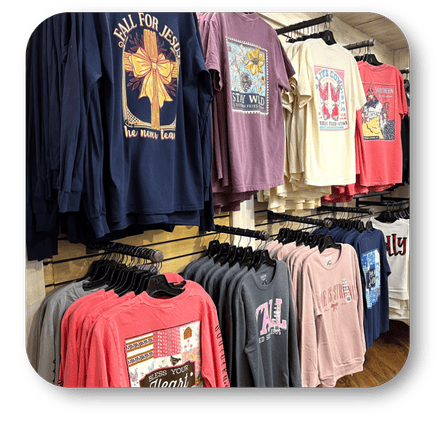 Display of various graphic  t-shirts at Dewayne's in Selma, NC minutes from Raleigh, Cary, Clayton, Garner, Smithfield, Goldsboro