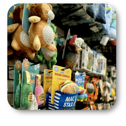 store display with plush Pet toys and packaged food items at Dewayne's in Selma, NC minutes from Raleigh, Cary, Clayton, Garner, Smithfield, Goldsboro