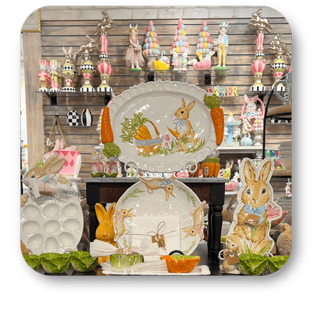 Display of decorative serveware with easter rabbit-themed designs  in the gift shop at Dewayne's in Selma, NC minutes from Raleigh, Cary, Clayton, Garner, Smithfield, Goldsboro