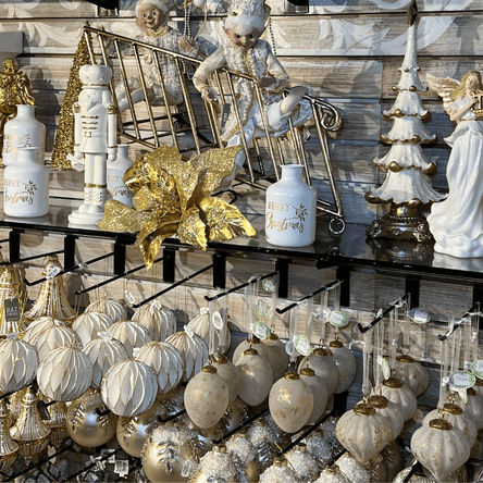 Decorative display of white and gold  ornaments, figurines, in the gold and glamour room at Dewayne's in Selma, NC