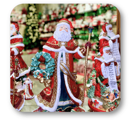 Decorative figure of a Santa Claus holding a wreath at Dewayne's in Selma, NC minutes from Raleigh, Cary, Clayton, Garner, Smithfield, Goldsboro