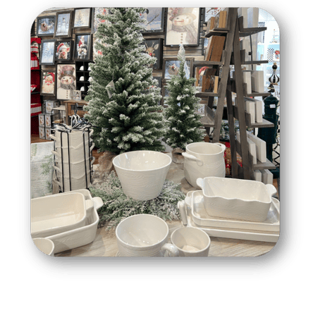 White ceramic bowls on a table with Christmas trees and decorations in the background at Dewayne's in Selma, NC minutes from Raleigh, Cary, Clayton, Garner, Smithfield, Goldsboro