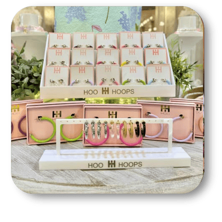 Display of Hoo Hoops with packaging on a wooden surface in the boutique at Dewayne's in Selma, NC minutes from Raleigh, Cary, Clayton, Garner, Smithfield, Goldsboro
