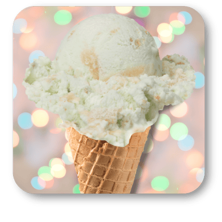 Key Lime Pie Ice cream cone with a scoop of ice cream against a blurred colorful light background in the sweet shop at Dewayne's in Selma, NC minutes from Raleigh, Cary, Clayton, Garner, Smithfield, Goldsboro