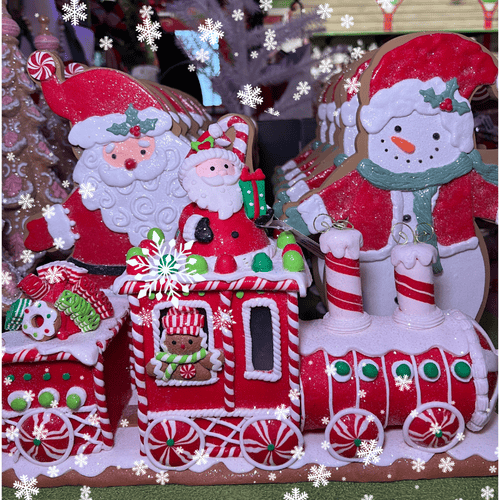 Decorative Christmas gingerbread snowmen and santa in Kringle's Kitchen in Christmas land 2025 at dewayne's