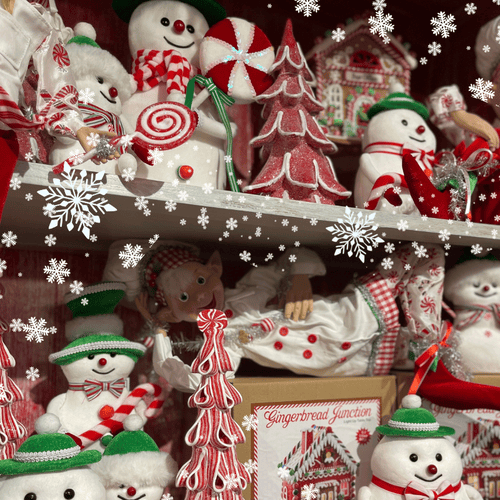 sweet Christmas-themed decorations including snowmen, candy canes, and gingerbread men in Kringle's Kitchen in Christmas land 2025 at dewayne's