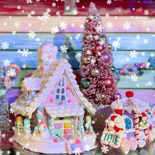 Colorful gingerbread house and tree with decorative elements in Kringle's Kitchen in Christmas land 2025 at dewayne's