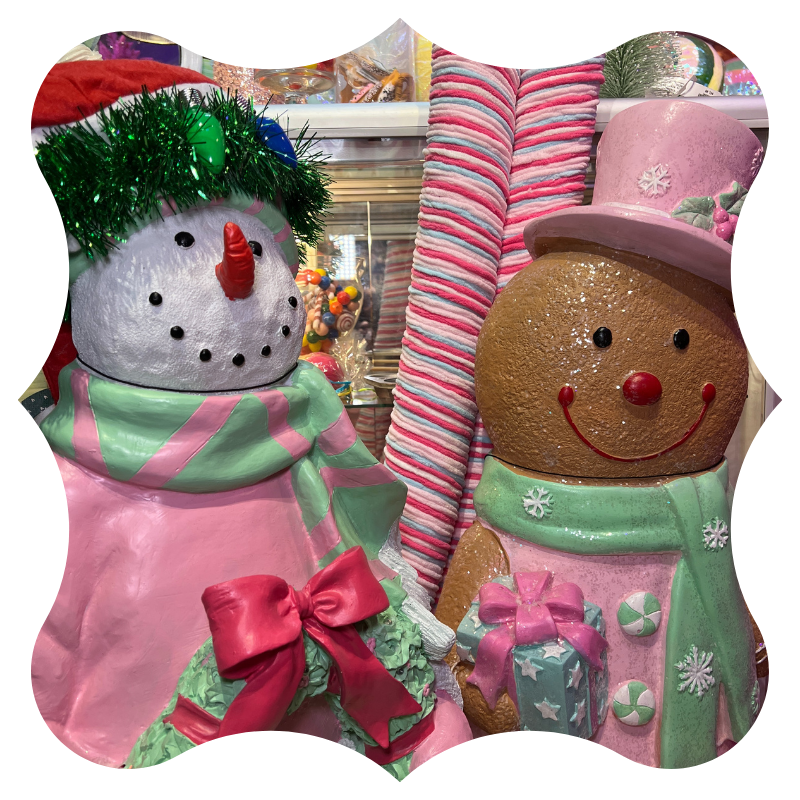 large whimsical snowman and gingerbread man in Kringle's Kitchen in Christmas land 2025 at dewayne's