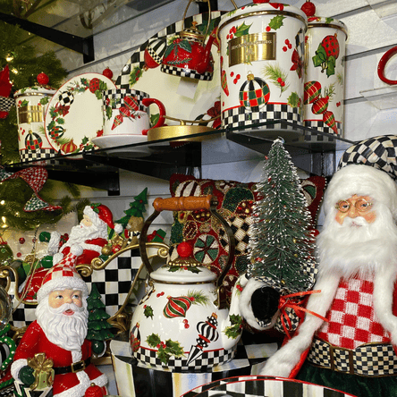 mackensie-childs canisters, teapots and santas  in the grand entrance room in christmas land 2025 at dewayne's