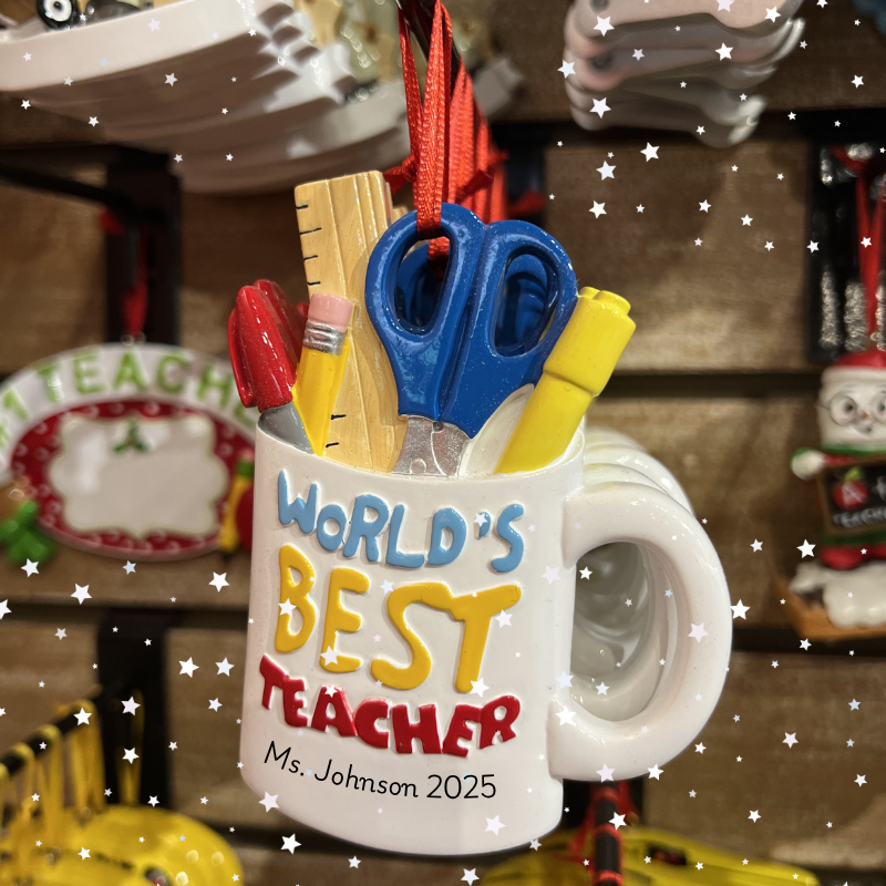 Decorative mug with 'World's Best Teacher' to personalize in christmas land 2025 at dewayne's