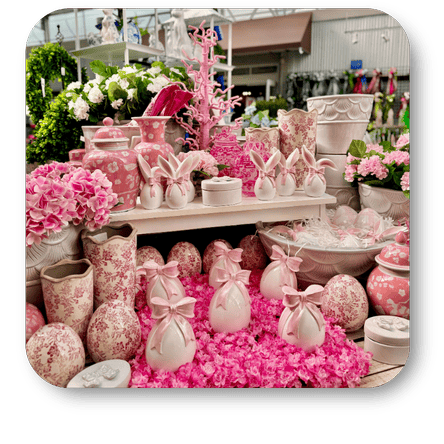 Display of pink Chinoiserie  decorative easter ceramics and planters in the greenhouse atrium at Dewayne's in Selma, NC minutes from Raleigh, Cary, Clayton, Garner, Smithfield, Goldsboro