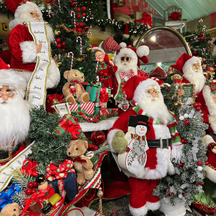 Various Santa Characters by Karen Didion  in the timeless treasure room of christmas land at Dewayne's in Selma, NC
