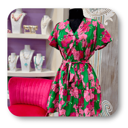 Floral dress on a mannequin with jewelry in the boutique at Dewayne's in Selma, NC minutes from Raleigh, Cary, Clayton, Garner, Smithfield, Goldsboro