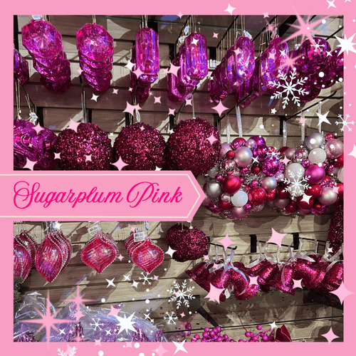 Decorative hot pink Christmas ornaments in sugarplum pink in the wrapped in red room of christmas land 2025 at dewaynes