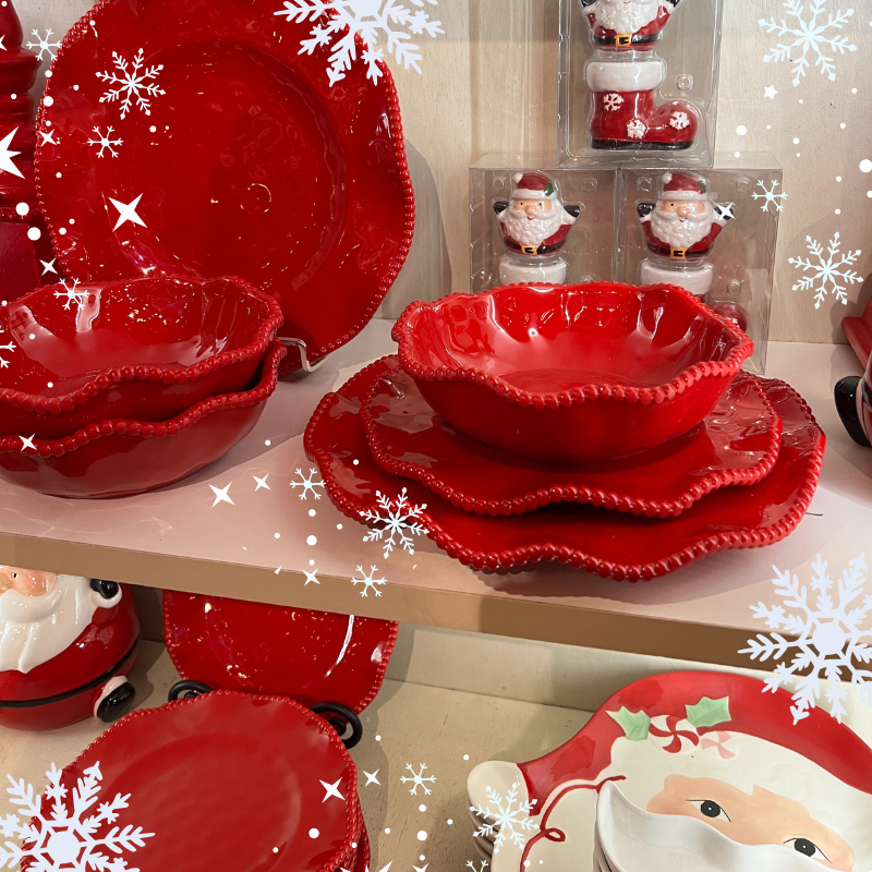 Christmas red ceramic tableware set with Santa Claus salt and pepper shakers in the wrapped in red room in christmas land 2025 at dewayne's