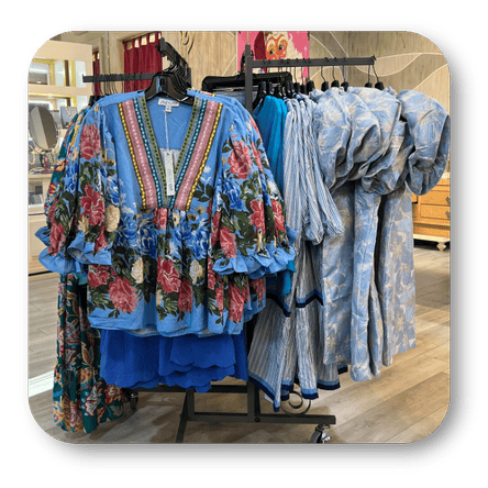 Women's Blue floral tops and dresses in the boutique at Dewayne's in Selma, NC minutes from Raleigh, Cary, Clayton, Garner, Smithfield, Goldsboro