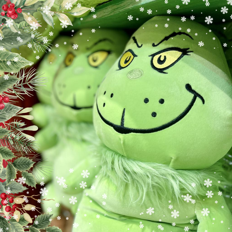 Green plush toys in santa's workshop in christmas land 2025 at dewayne's