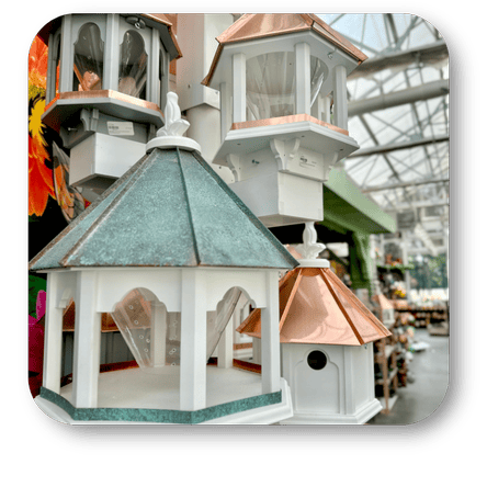 Decorative birdhouses with copper roofs  in the greenhouse atrium at Dewayne's in Selma, NC minutes from Raleigh, Cary, Clayton, Garner, Smithfield, Goldsboro