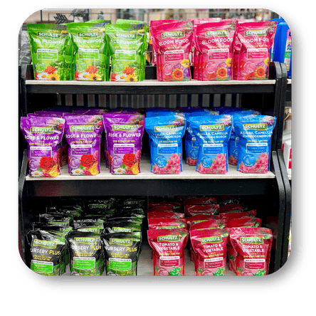 Display of various flower and vegetable food packages  in the greenhouse atrium at Dewayne's in Selma, NC minutes from Raleigh, Cary, Clayton, Garner, Smithfield, Goldsboro