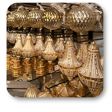 Decorative gold ornaments  in the gold and glamour room in christmas land at Dewayne's in Selma, NC minutes from Raleigh, Cary, Clayton, Garner, Smithfield, Goldsboro