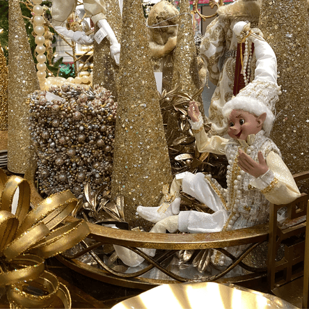 golden elves decor in the gold and glamour room of christmas land 2025 at dewayne's