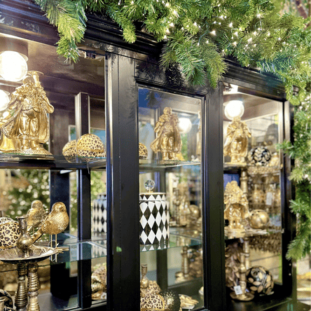 black and white and gold decor in the gold and glamour room in christmas land 2025 at dewayne's