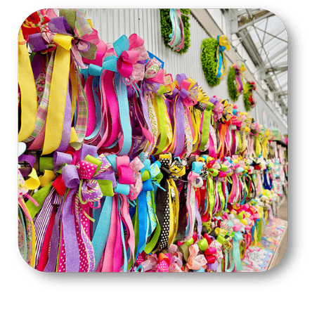 Colorful Happy Bows to add the finishing touch in the greenhouse atrium at Dewayne's in Selma, NC minutes from Raleigh, Cary, Clayton, Garner, Smithfield, Goldsboro