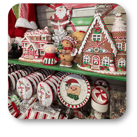 Display of Christmas-themed gingerbread houses, cookies, and Christmas plates and ornaments in the Kringle's Kitchen room in christmas land 2025 at Dewayne's in Selma, NC minutes from Raleigh, Cary, Clayton, Garner, Smithfield, Goldsboro