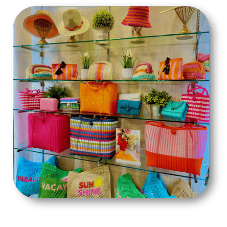 Collage of vibrant spring handbags, purses and hats in the boutique at Dewayne's in Selma, NC minutes from Raleigh, Cary, Clayton, Garner, Smithfield, Goldsboro
