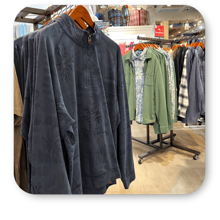 Dark gray fleece pullover on a hanger  in the men's shoppe at Dewayne's in Selma, NC minutes from Raleigh, Cary, Clayton, Garner, Smithfield, Goldsboro