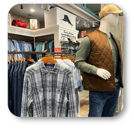 Mannequin wearing a brown vest and plaid shirt - tommy bahama clothing in the men's shoppe at Dewayne's in Selma, NC minutes from Raleigh, Cary, Clayton, Garner, Smithfield, Goldsboro