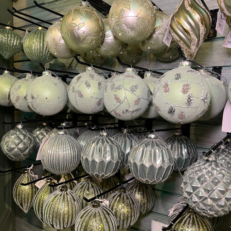 Decorative glass ornaments  in the moments of thyme room in christmas land 2025 at dewayne's