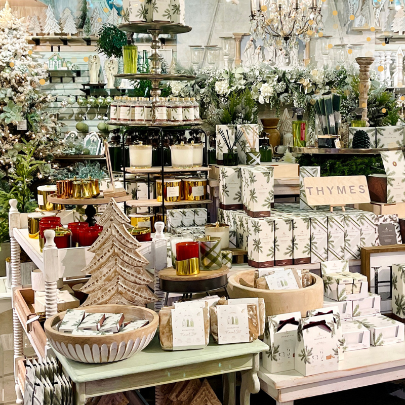 Display of Thymes candles, soaps and holiday scents  in the moments of thyme room in christmas land 2025 at dewayne's