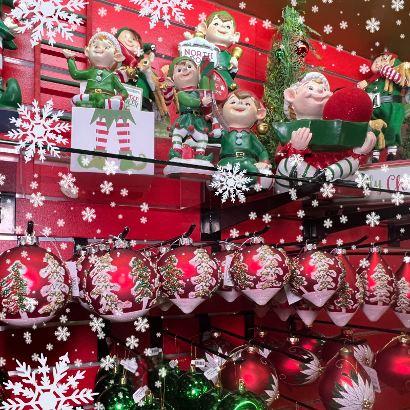 figurines of elves and holiday ornaments in santa's workshop in christmas land 2025 at dewayne's