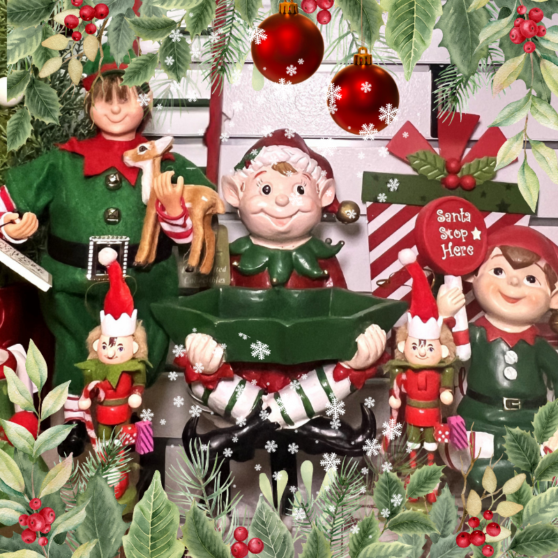 Christmas-themed figurines with elves, reindeer, and holiday decorations in santa's workshop in christmas land 2025 at dewayne's