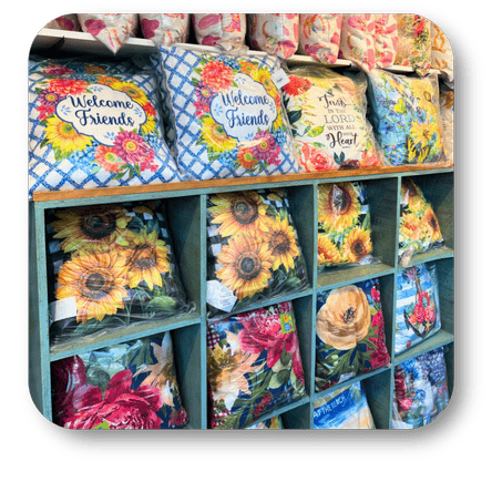 colorful outdoor porch pillows  in the greenhouse atrium at Dewayne's in Selma, NC minutes from Raleigh, Cary, Clayton, Garner, Smithfield, Goldsboro 