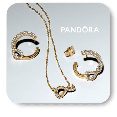 Pandora jewelry set with necklace and rings on a light gray background in the boutique at Dewayne's in Selma, NC minutes from Raleigh, Cary, Clayton, Garner, Smithfield, Goldsboro