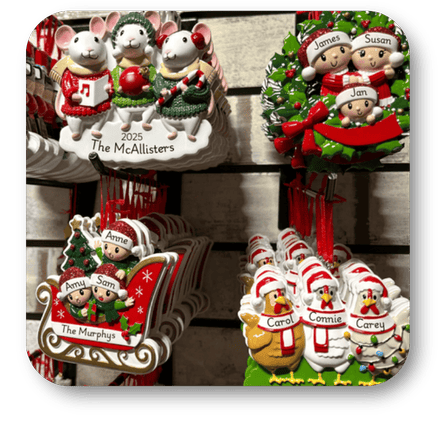 Collection of personalized Christmas ornaments featuring family names and festive designs at Dewayne's in Selma, NC minutes from Raleigh, Cary, Clayton, Garner, Smithfield, Goldsboro