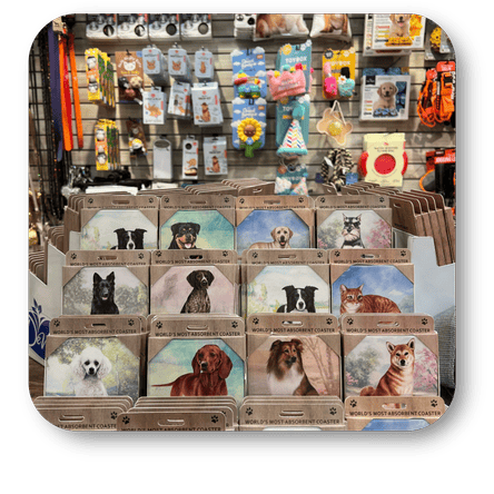 store display with pet coasters, plush Pet toys and packaged food items at Dewayne's in Selma, NC minutes from Raleigh, Cary, Clayton, Garner, Smithfield, Goldsboro