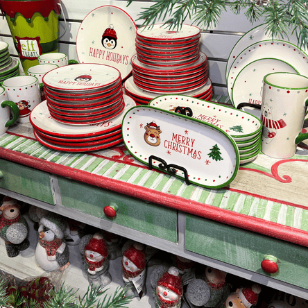 Christmas serveware, plates and mugs in santa's workshop in christmas land at dewayne's in selma, NC