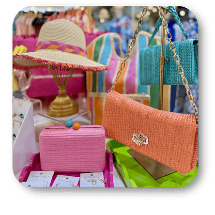 Colorful spring Easter handbags and a hats in the boutique at Dewayne's in Selma, NC minutes from Raleigh, Cary, Clayton, Garner, Smithfield, Goldsboro
