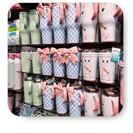 Display of colorful swig tumblers in the gift shop at Dewayne's in Selma, NC minutes from Raleigh, Cary, Clayton, Garner, Smithfield, Goldsboro