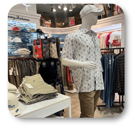 Mannequin wearing a patterned Tommy Bahama shirt and cap in the men's shoppe at Dewayne's in Selma, NC minutes from Raleigh, Cary, Clayton, Garner, Smithfield, Goldsboro